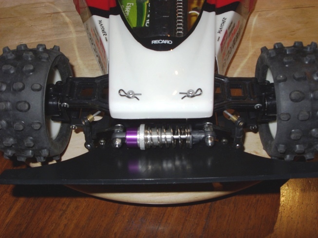 close up view of the front suspension and roll bar